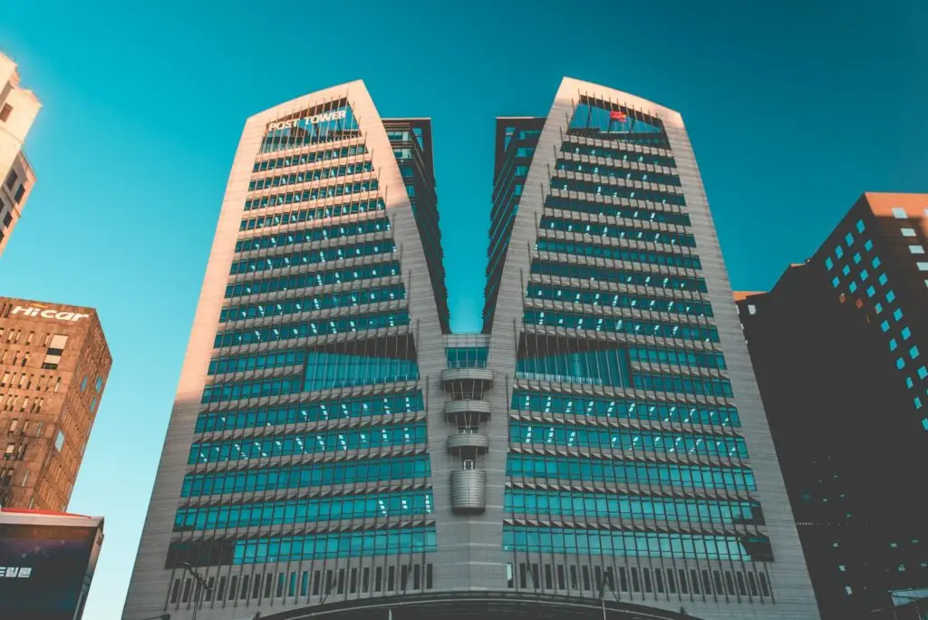 gray high rise buildings under blue sky